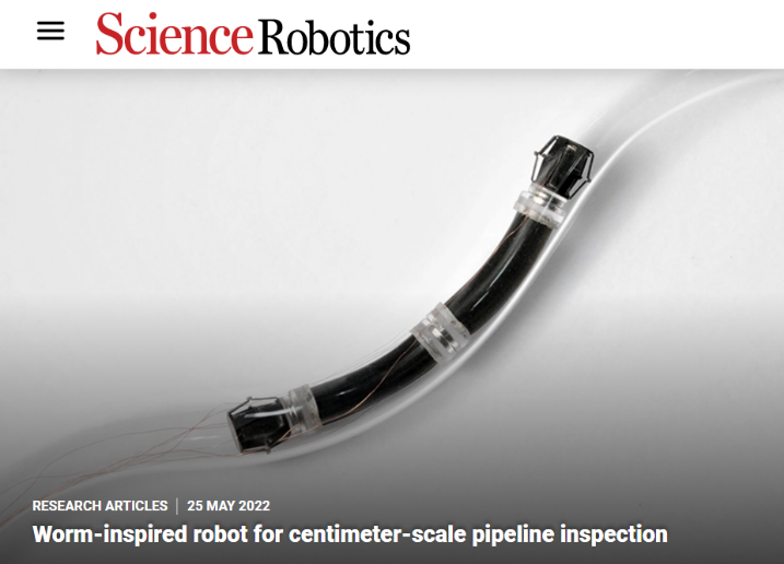 20220526-清华大学机械系研发微小型管道机器人，实现亚厘米级管道高效探测-机械系-微型管道机器人在弯曲管道中行进.png
